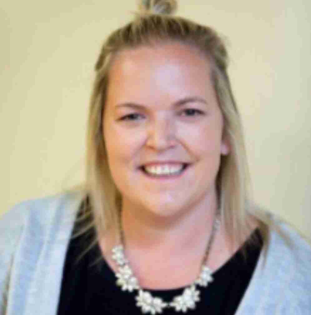 headshot of Tracy Sims