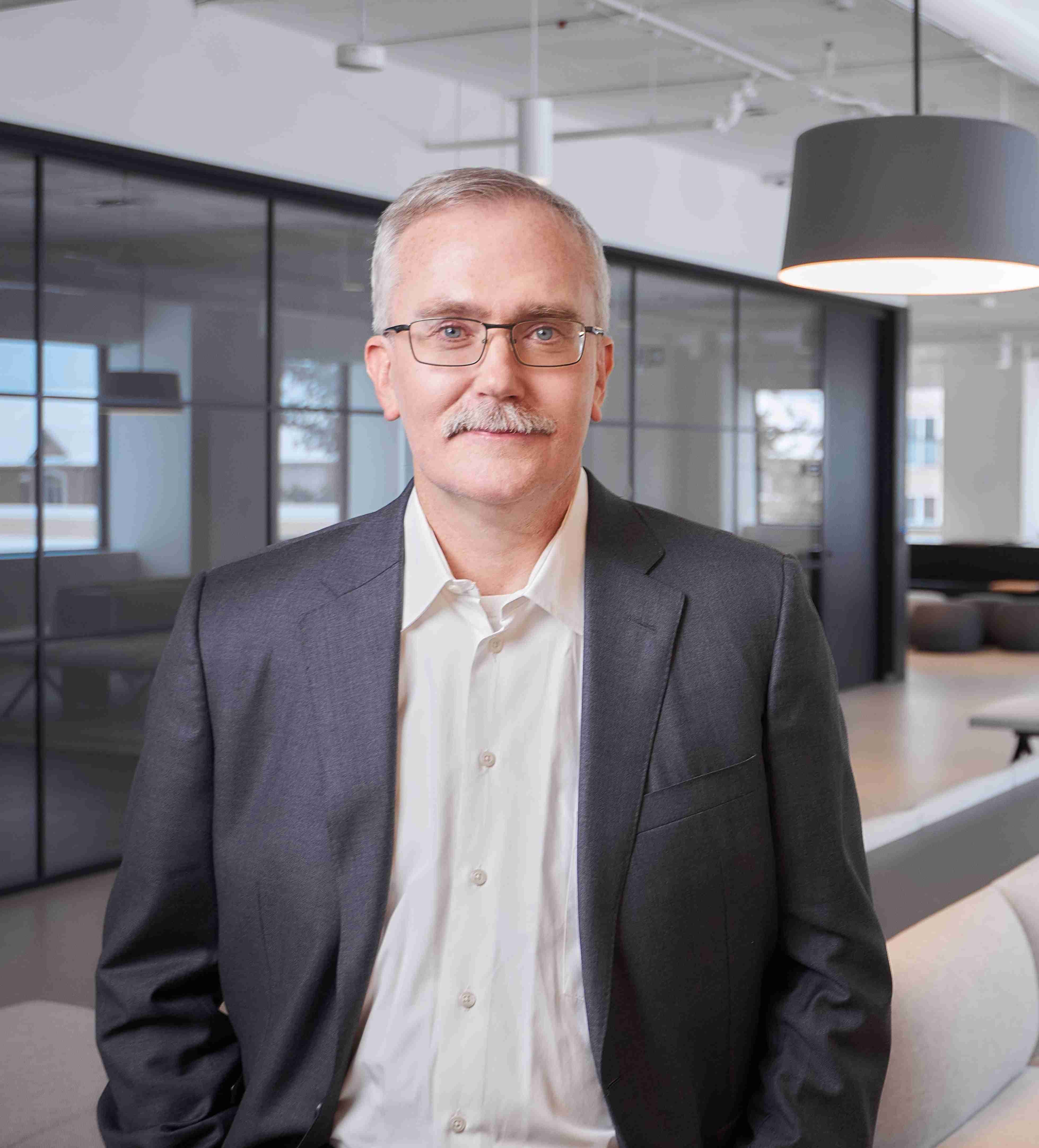 headshot of Aled ab  Iorwerth