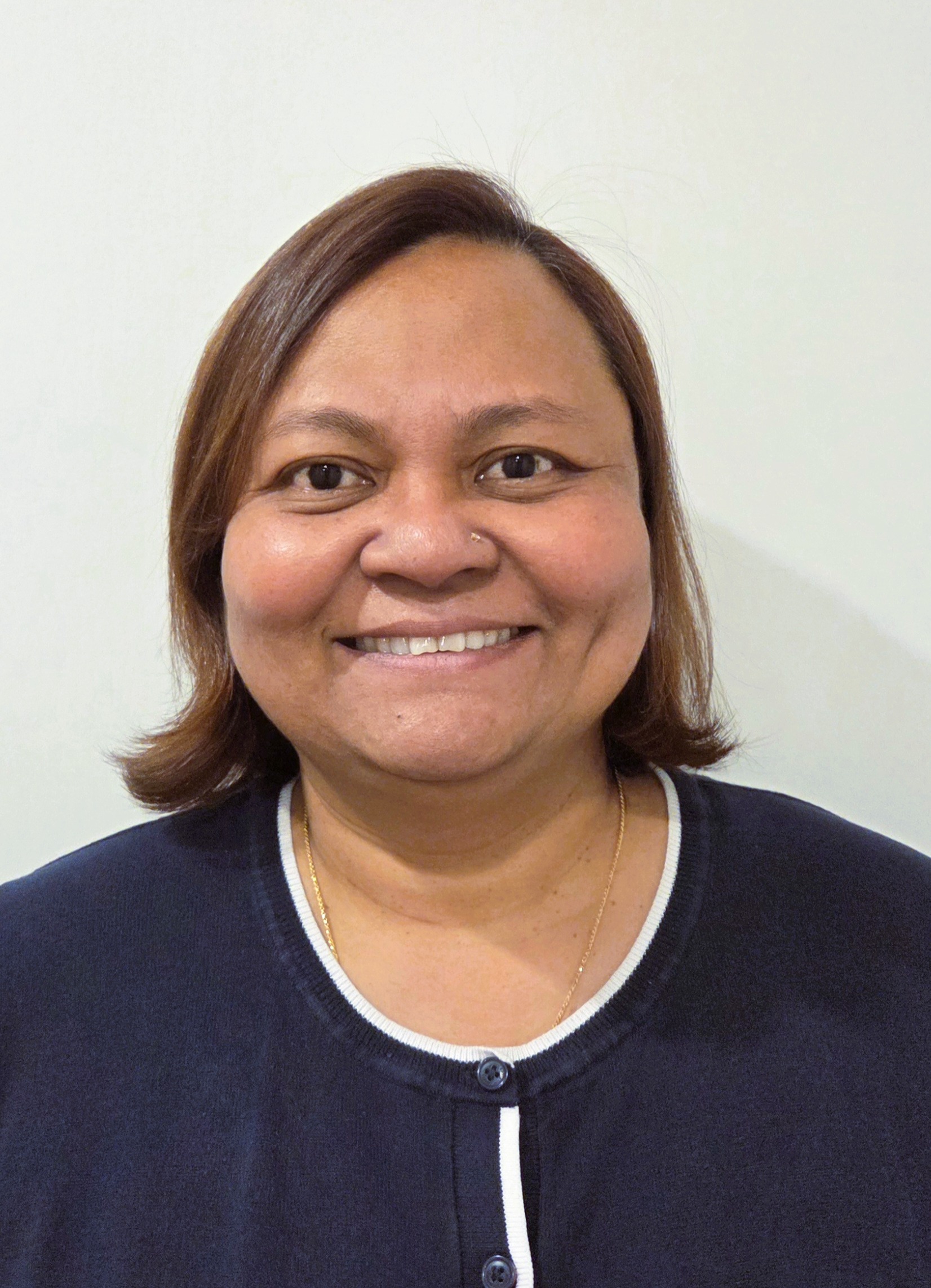 headshot of Helen Arputhanathan